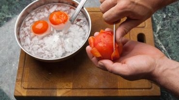 you can peel the blanched tomatoes after puting in ice-cold water
