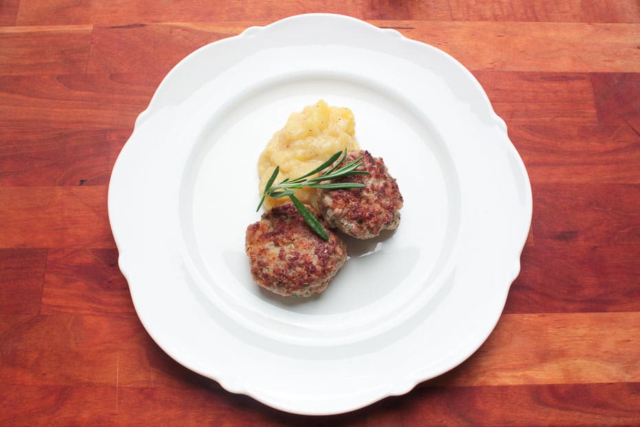 recipe for meatballs close up with potato salad