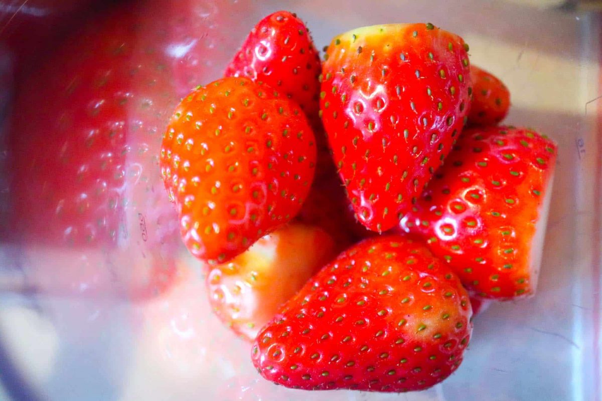 Strawberries in a mug while marinating