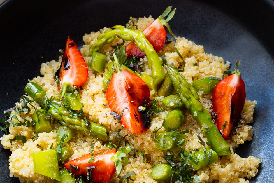 Serve the quinoa salad with strawberries and asparagus.