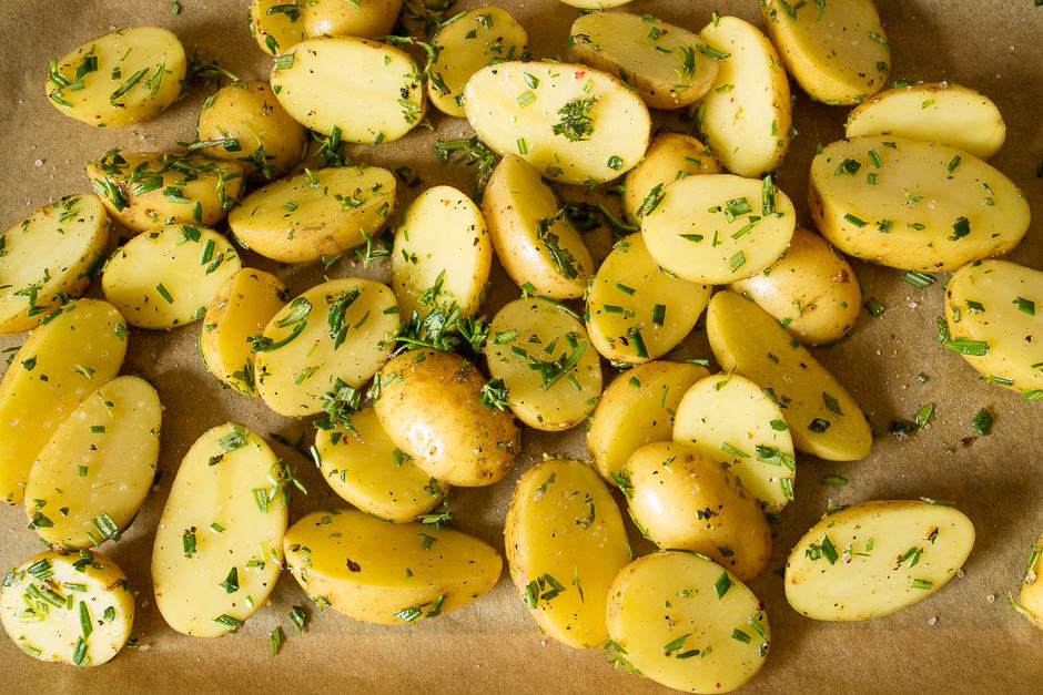 Potatoes on the baking sheet, raw