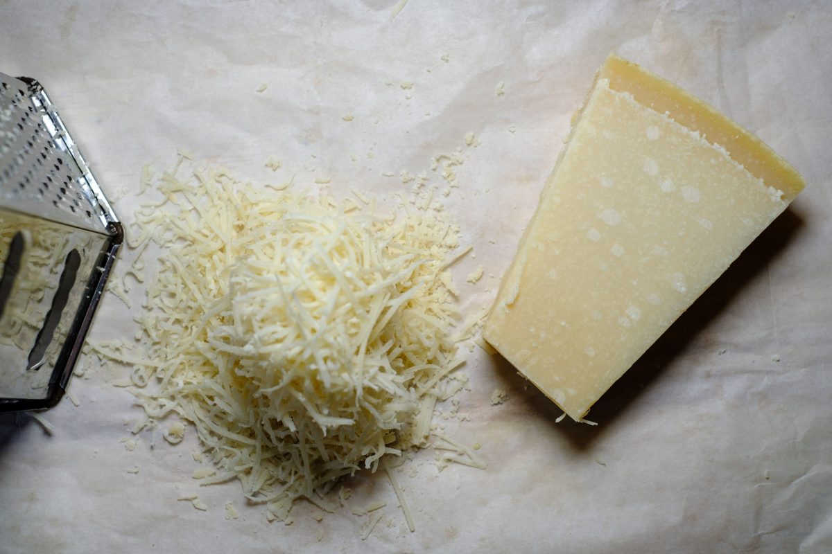 Grate parmesan cheese