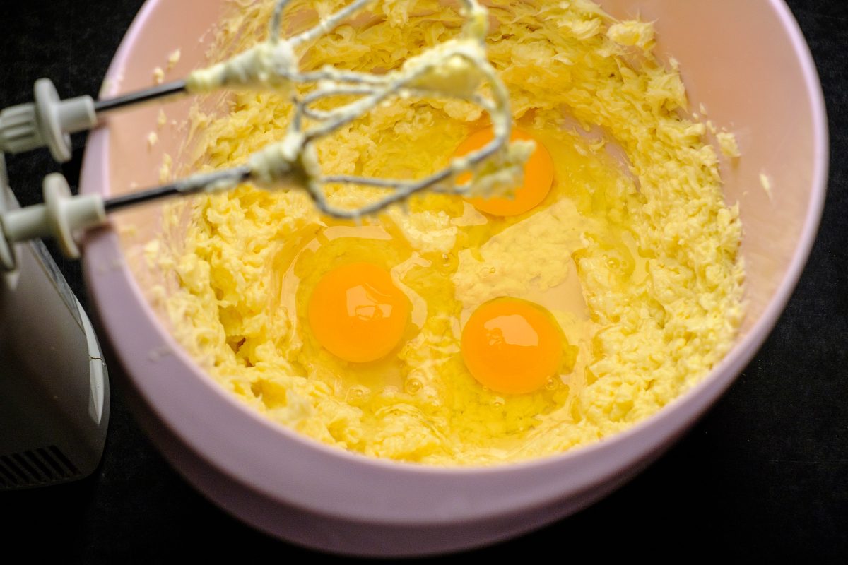 Add eggs to butter