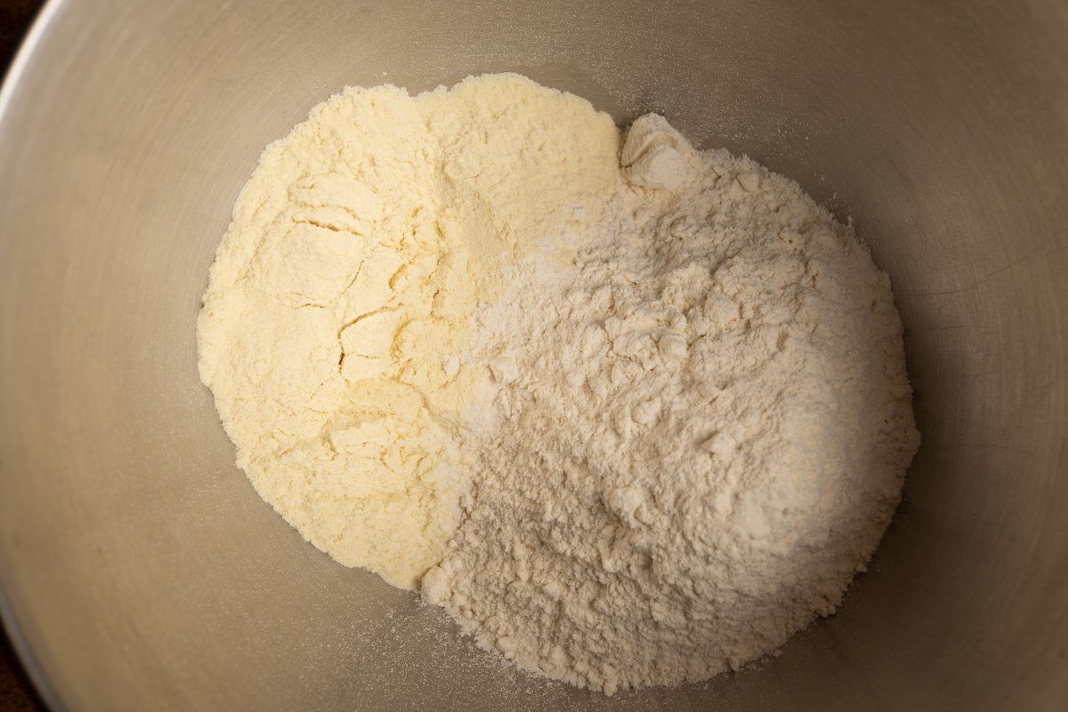 Pizza dough two types of flour in bowl