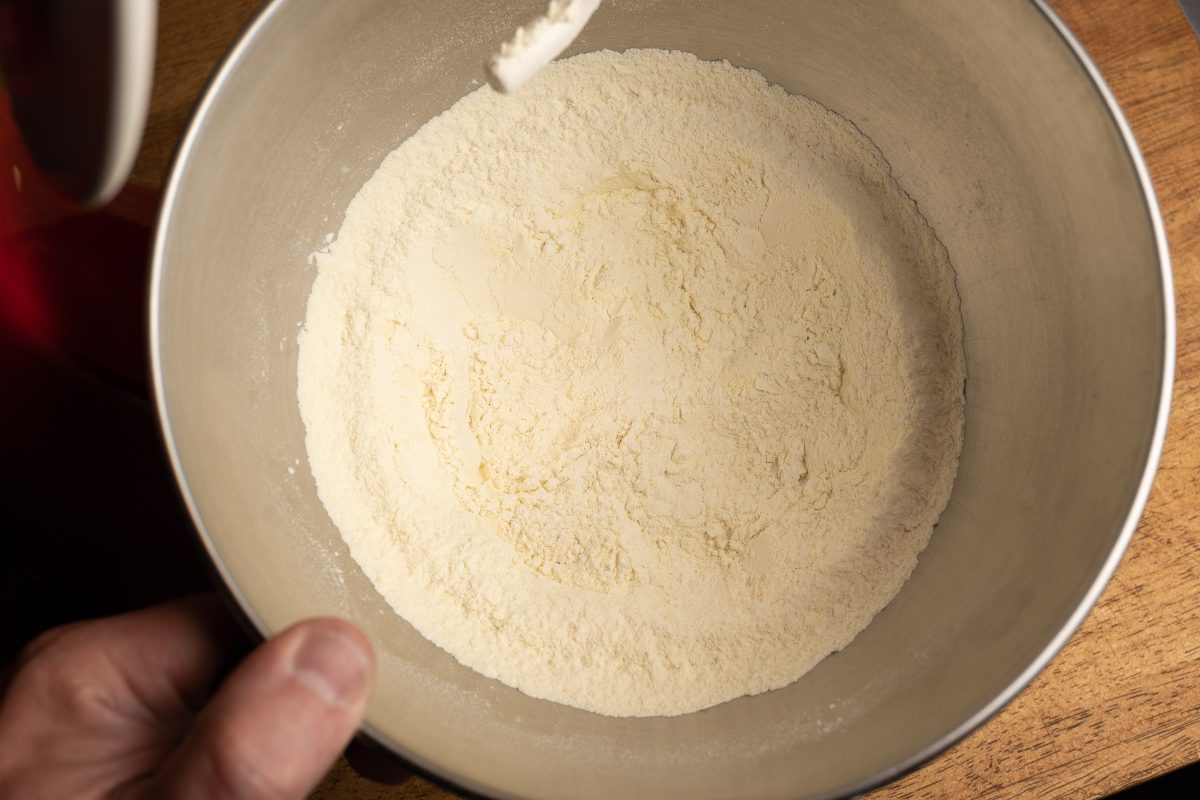 Pizza dough mixed two types of flour in the bowl