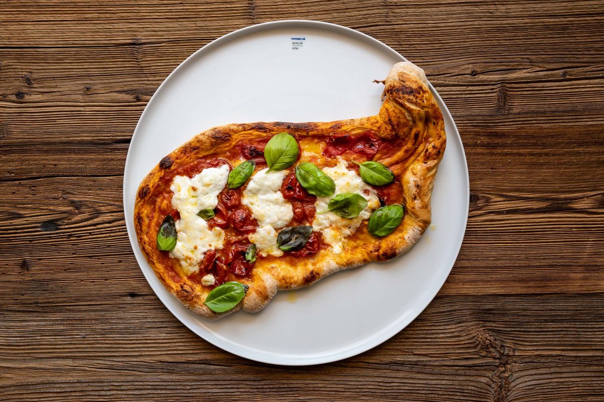 Pizza Margherita with mozzarella and basil