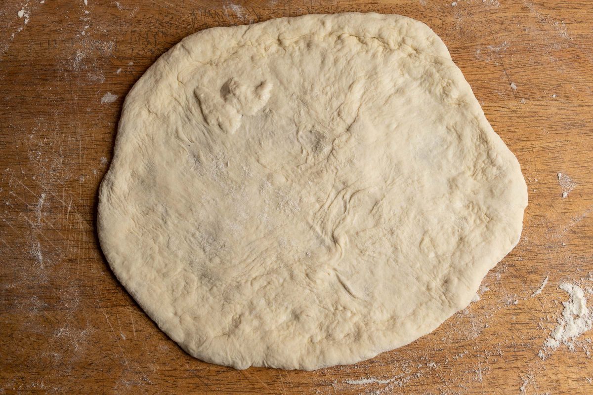 Shaped pizza dough for Pizza Margherita