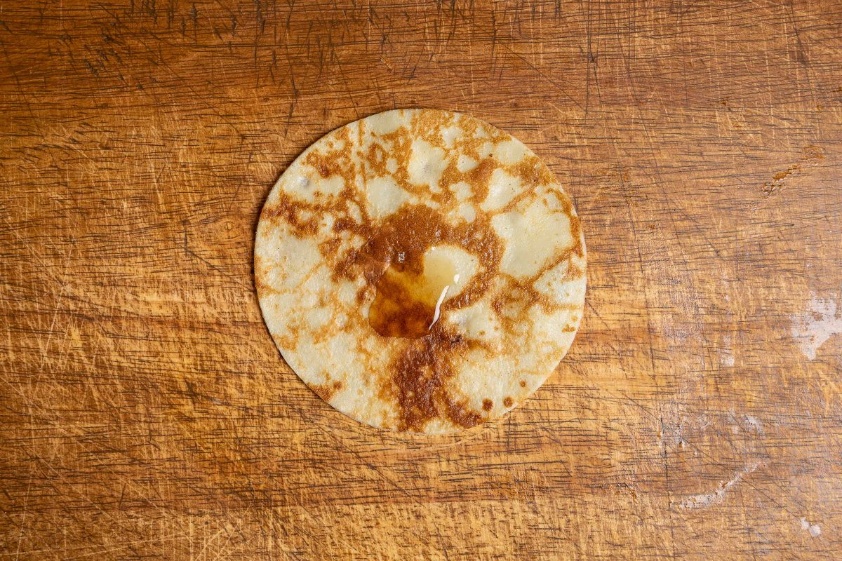 Cut out pancake for apple pancakes on board