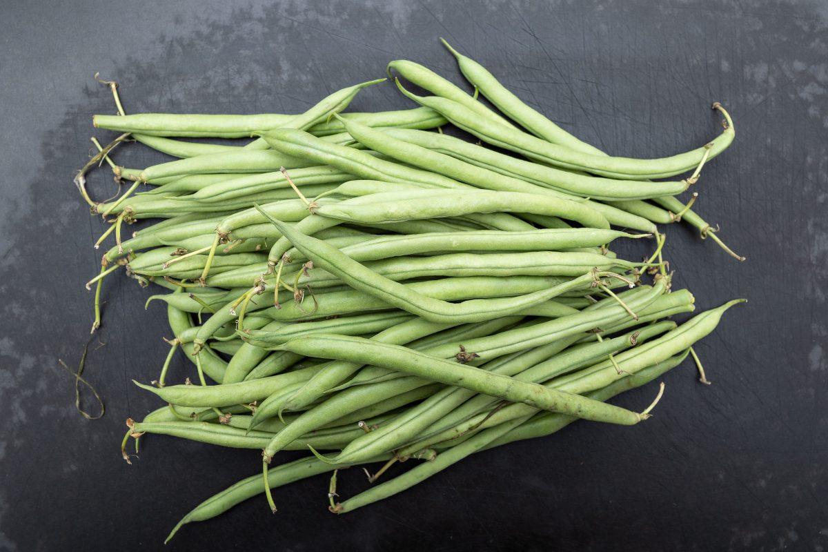 Fresh green beans on the cutting board
