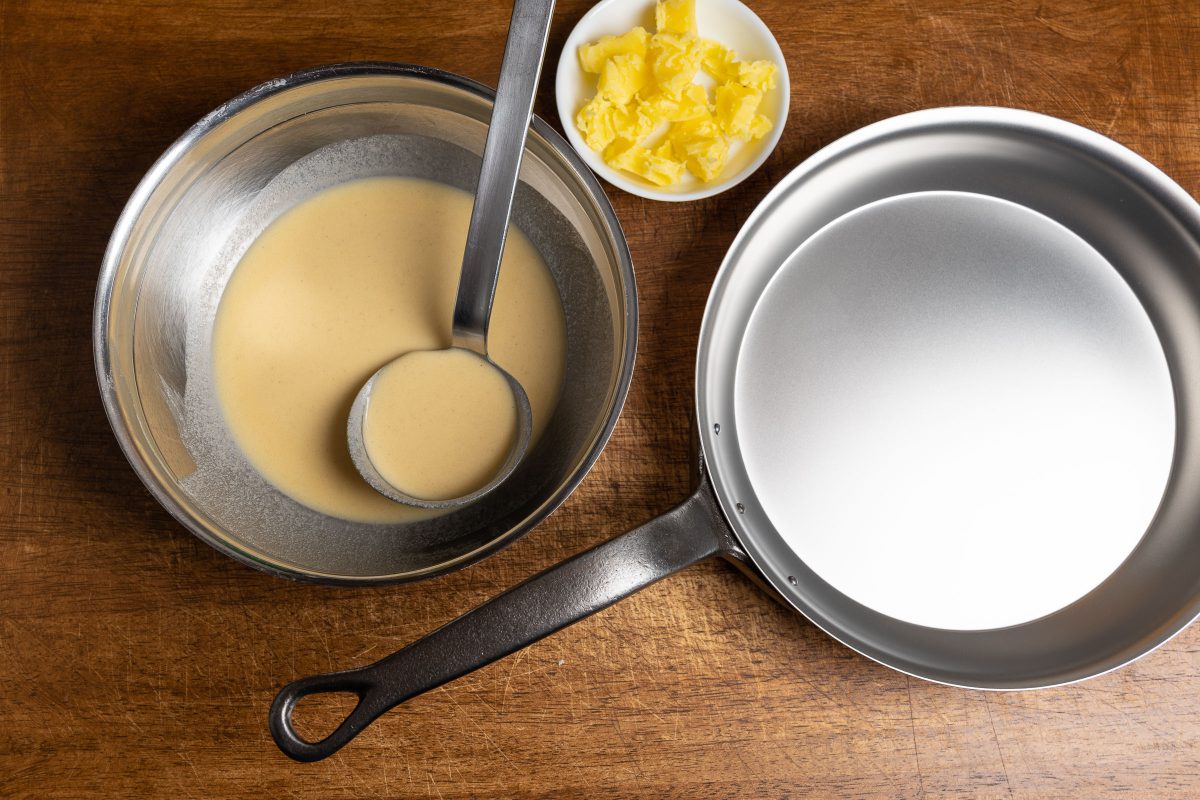 Pancake batter with pan and clarified butter