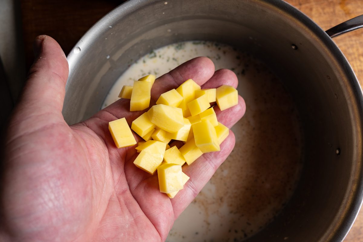 Add potatoes to the soup to bind